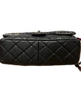 Chanel medium flap bag with tweed flap