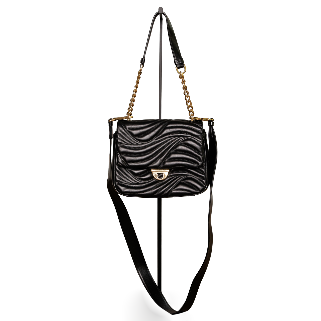 Salvatore Ferragamo Black quilted shoulder bag with gold embellishment Style Definery