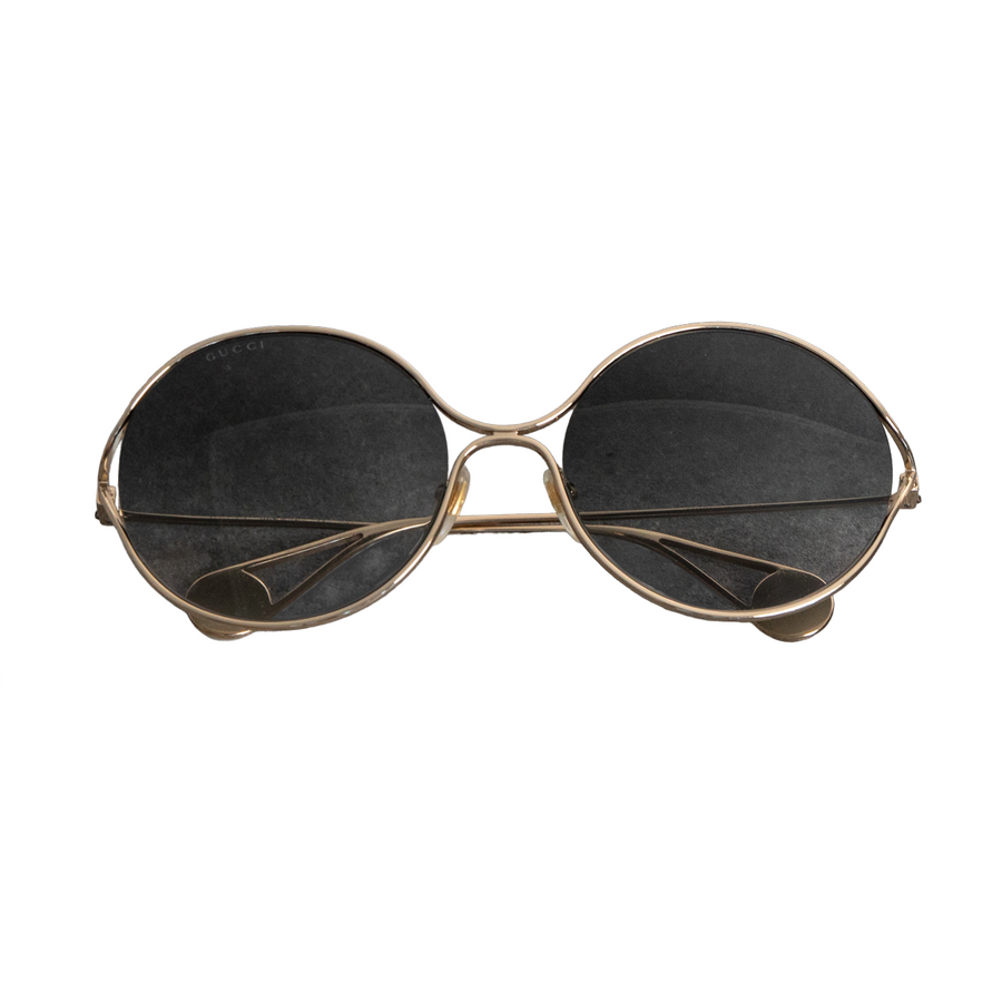 Gucci gold sunglasses with gray gradient lenses and pearl embellishments