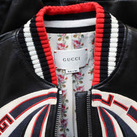 Gucci children's leather jacket with embroidered bow print