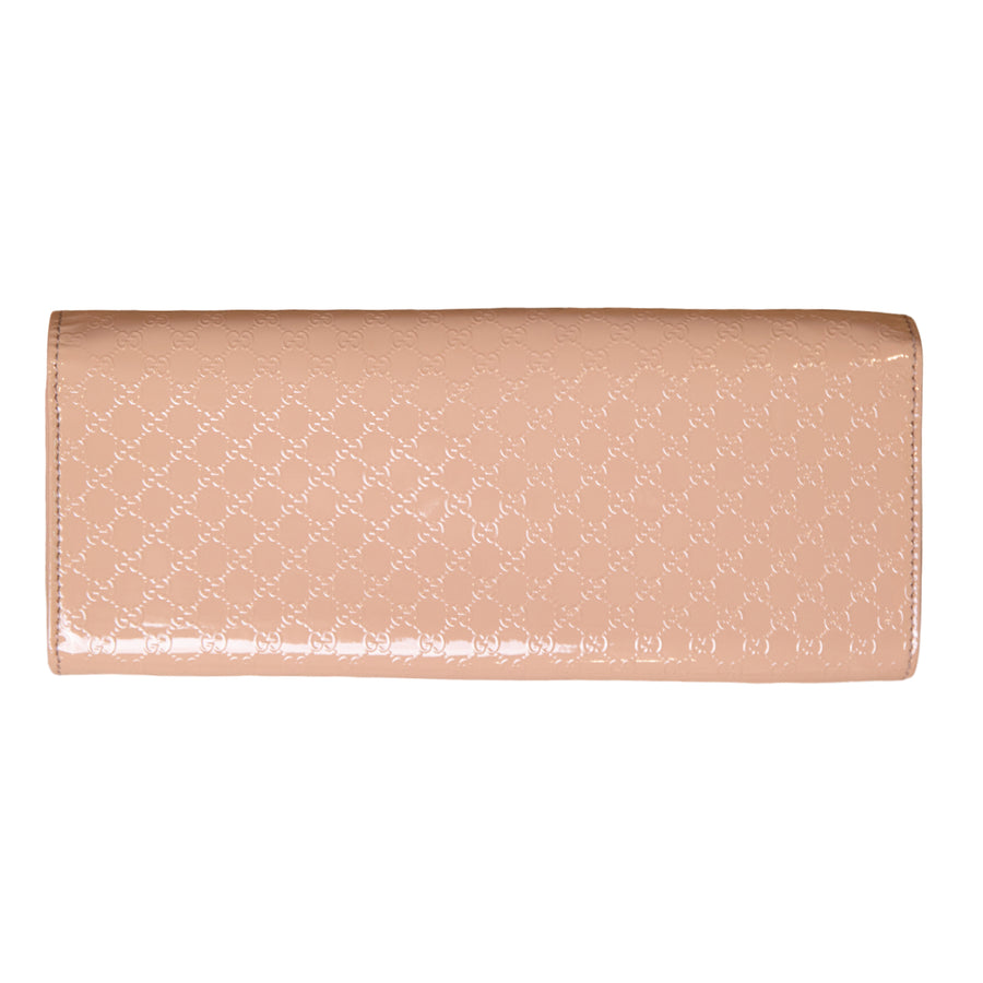 Gucci patent leather clutch with GG print