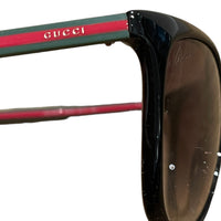 Gucci Sonnenbrille mit Signature Bügeln
