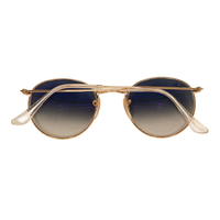 Ray Ban sunglasses with gold frame and blue lenses