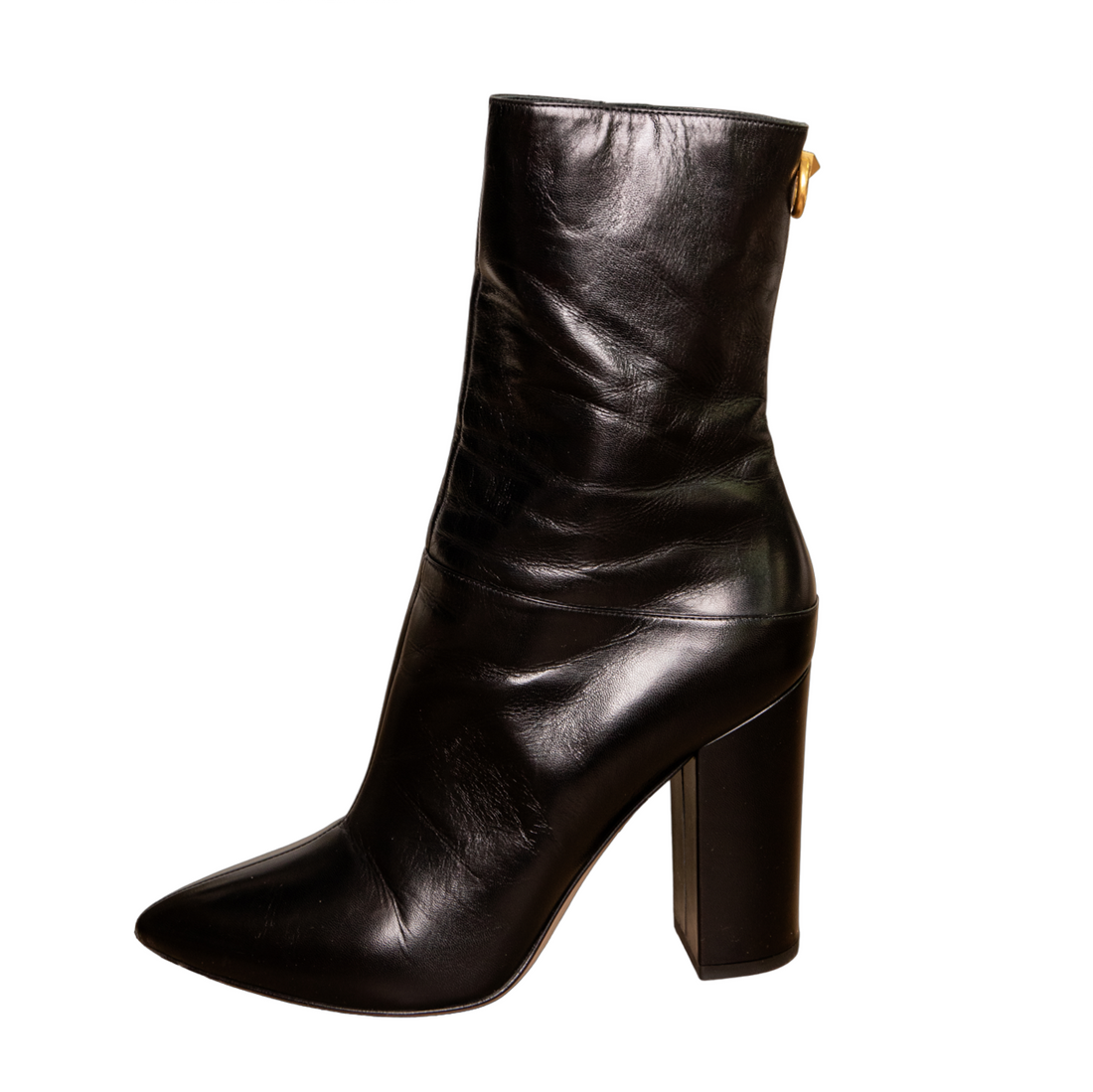 Valentino black ankle boots with gold design elements