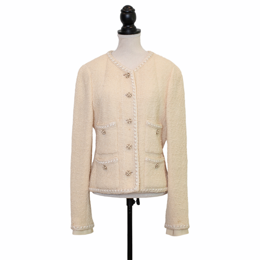 Chanel Boucle jacket with patch pockets and beaded logo buttons