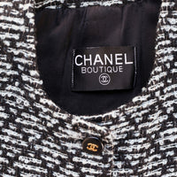 Chanel tweed jacket with logo buttons and breast pockets